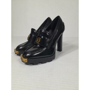 Elegant Black Heels with Gold Accents
